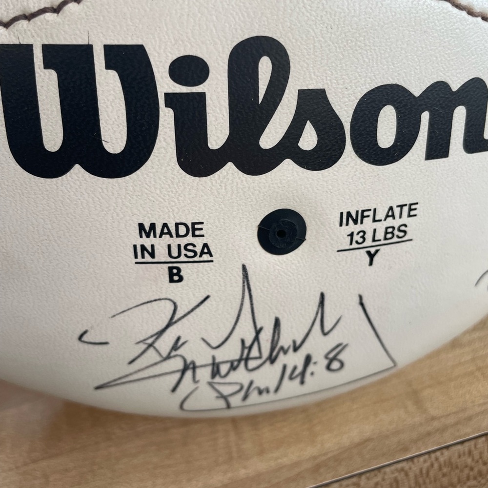 Autographed Football with several NFL Players